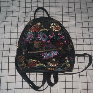 floral and faux leather book bag